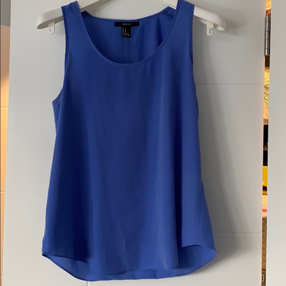 Blue tank with black zipper detail on back